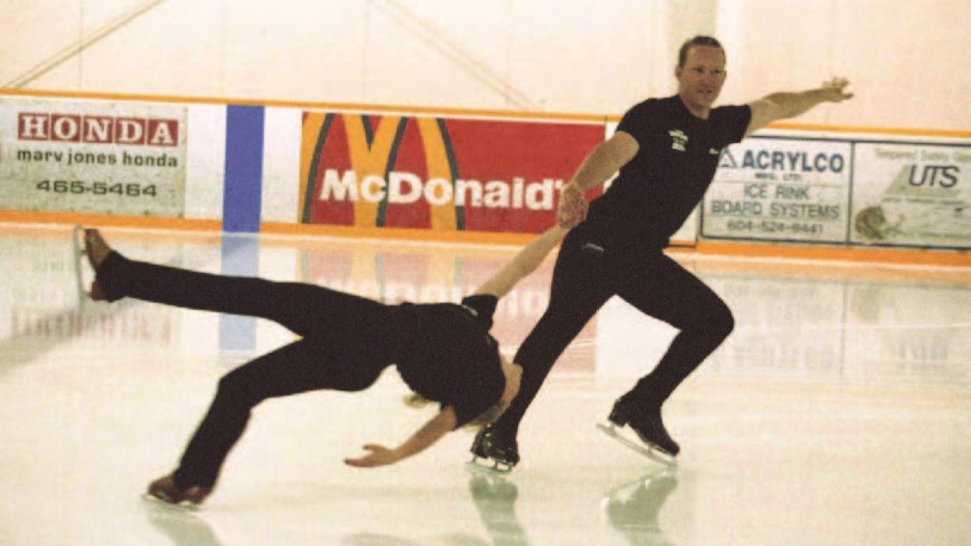 Rob Williams and his cousin Jodi Barnes perform a figure skating pair trick, where he spins her around by the arm.